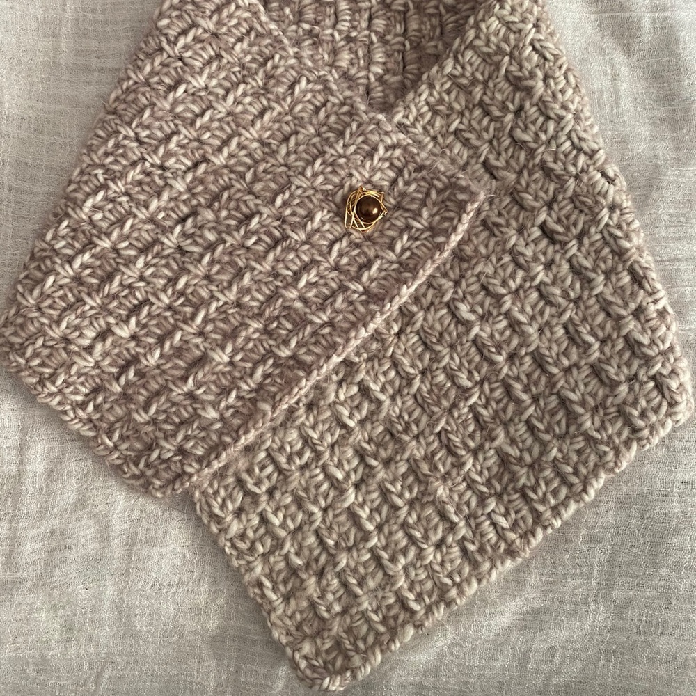 Adjustable cowl neck warmer.  Knit scarf